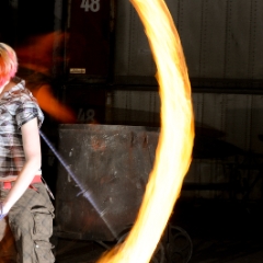 Nicole spins rope dart with rear curtain flash