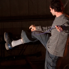 Sam with rope dart and rear curtain flash