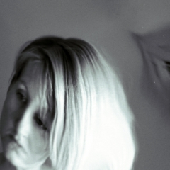 Sad woman reflected in mylar