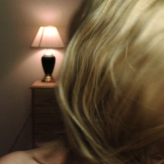 Flippy hair, face not shown, head turned left