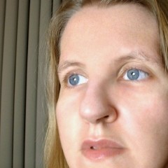 Looking into the distance pensively